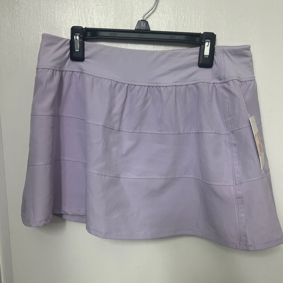 GB Active Pants - GB Sport Lilac skort. 2 side pockets on shorts under the skirt. Size L NWT